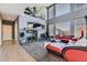 Spacious living room with high ceilings, fireplace, and open floor plan, offering an airy ambiance at 11591 S Maiden Hair Way, Parker, CO 80134
