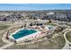 Aerial community view featuring pool, picnic tables and walking trails at 17382 Bluetrail Ave, Parker, CO 80134