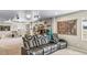 Finished basement with theater seating, arcade games, and media area at 17382 Bluetrail Ave, Parker, CO 80134
