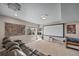 Finished basement with theater screen at 17382 Bluetrail Ave, Parker, CO 80134