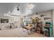 Entertainment basement with an arcade and home accents, creating a fun and versatile space at 17382 Bluetrail Ave, Parker, CO 80134