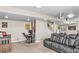 Finished basement with media area and desk at 17382 Bluetrail Ave, Parker, CO 80134