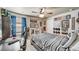 Stylish bedroom with a baseball theme, ceiling fan, and a cozy bed at 17382 Bluetrail Ave, Parker, CO 80134