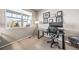 Office featuring a desk and large window for plenty of natural light at 17382 Bluetrail Ave, Parker, CO 80134