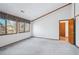 Spacious bedroom with large windows offering lots of natural light and neutral carpeting at 2275 E 129Th Ave, Thornton, CO 80241