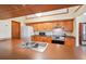 Kitchen area featuring wood cabinets, stainless steel appliances and a double sink at 2275 E 129Th Ave, Thornton, CO 80241