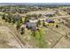 Beautiful aerial view of the home with the large lot, mature trees and long range views at 19281 E Hinsdale Ln, Centennial, CO 80016