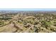 Extensive aerial showcasing a neighborhood set among rolling hills and sparse trees at 19281 E Hinsdale Ln, Centennial, CO 80016