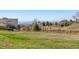 Large grassy backyard space with beautiful view of the neighborhood at 19281 E Hinsdale Ln, Centennial, CO 80016