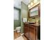 Stylish powder bathroom with hardwood floors, new vanity, and designer faucet at 19281 E Hinsdale Ln, Centennial, CO 80016