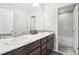 Double vanity bathroom with a separate tub at 7916 S Grand Baker Way, Aurora, CO 80016