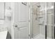 Bathroom with shower and mosaic tile accents at 7916 S Grand Baker Way, Aurora, CO 80016