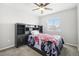 Bedroom with a double bed and built-in shelving at 7916 S Grand Baker Way, Aurora, CO 80016