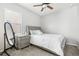 Bright bedroom with double bed, nightstand and mirror at 7916 S Grand Baker Way, Aurora, CO 80016