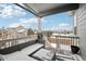 Covered deck with a view and seating area, perfect for relaxing at 7916 S Grand Baker Way, Aurora, CO 80016