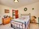 Well-lit bedroom with decorative touches and plenty of space at 13012 S Wamblee Valley Rd, Conifer, CO 80433
