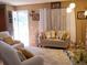 Relaxing living room with light-colored furniture and hardwood floors at 1227 S Uvalda St, Aurora, CO 80012