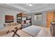 Entertaining bedroom with bunkbeds, sofa, game table and a window at 79 Beaver Rd, Idaho Springs, CO 80452