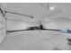 Large garage with a finished ceiling, ample space, and room for storage or activities at 79 Beaver Rd, Idaho Springs, CO 80452