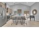 Spacious kitchen featuring a large island with seating, stainless appliances, and wood cabinets at 79 Beaver Rd, Idaho Springs, CO 80452