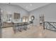 Bright and airy kitchen with an island and seating that opens into the dining and living spaces at 79 Beaver Rd, Idaho Springs, CO 80452