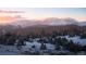 Picturesque mountain view with snow-capped peaks, a forest of evergreen trees, and a serene winter landscape at 79 Beaver Rd, Idaho Springs, CO 80452