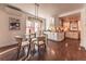 Bright dining area featuring modern lighting, sleek furniture, and a seamless transition to the kitchen area at 537 N Logan St, Denver, CO 80203