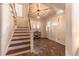 Charming entryway featuring an interior staircase, unique tile flooring, and a well-lit foyer leading into the home at 537 N Logan St, Denver, CO 80203