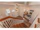Entryway with wooden stairs, a tile floor, and a view into the living room with a fireplace at 537 N Logan St, Denver, CO 80203