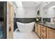 Bright bathroom featuring a freestanding tub, walk-in shower and granite vanity at 1124 E 130Th Ave # C, Thornton, CO 80241