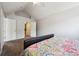 Bright bedroom featuring a vaulted ceiling, neutral paint and plush carpet at 1124 E 130Th Ave # C, Thornton, CO 80241