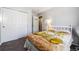Cozy bedroom featuring a large closet, neutral paint and plush carpet at 1124 E 130Th Ave # C, Thornton, CO 80241