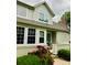 Townhome with great curb appeal and a beautifully landscaped front entrance at 1124 E 130Th Ave # C, Thornton, CO 80241
