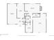 Floor plan of the first floor showcasing the layout of living spaces, kitchen, and garage at 2492 S Yarrow St, Lakewood, CO 80227