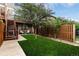 Private backyard featuring a well-maintained lawn, providing a peaceful and inviting outdoor space at 19 S Harrison St, Denver, CO 80209