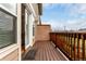 Enjoy outdoor living on this private balcony with wood flooring and railing, perfect for relaxing or entertaining at 19 S Harrison St, Denver, CO 80209