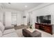 Comfortable living room featuring sofa, storage, and neutral colors at 19 S Harrison St, Denver, CO 80209