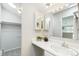Bathroom featuring modern vanity, storage cabinet, and ample lighting at 1842 Canyon Blvd # 209, Boulder, CO 80302