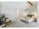 Bright bedroom features vaulted ceilings, neutral carpet and modern decor at 1842 Canyon Blvd # 209, Boulder, CO 80302