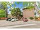 Exterior view of a brick building with a parking lot at 1842 Canyon Blvd # 209, Boulder, CO 80302