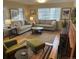 Inviting living room with hardwood floors, fireplace, and ample natural light at 701 S Clayton St, Denver, CO 80209