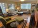 Warm and inviting living room featuring hardwood floors, plush sofas, and ample natural light at 701 S Clayton St, Denver, CO 80209