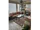 Bright sunroom featuring a ceiling fan and block glass windows at 701 S Clayton St, Denver, CO 80209