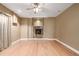 Cozy living room with a fireplace and hardwood floors at 301 Amethyst Way, Superior, CO 80027