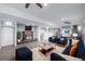 Spacious living room featuring a fireplace, flat screen TV, and comfortable seating area at 301 Amethyst Way, Superior, CO 80027