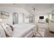 Spacious main bedroom features a ceiling fan and neutral decor with ample natural lighting at 301 Amethyst Way, Superior, CO 80027