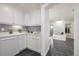 Mud room including cabinets, sink and view into adjacent area at 301 Amethyst Way, Superior, CO 80027