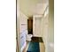 Bright bathroom featuring tiled floors, a shower, and a modern sink at 13024 E Alaska Pl, Aurora, CO 80012