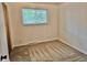 Bright and airy bedroom features a large window, providing great natural light at 13024 E Alaska Pl, Aurora, CO 80012