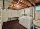 Functional laundry room with washer, dryer, and sink, providing convenience and practicality at 13024 E Alaska Pl, Aurora, CO 80012